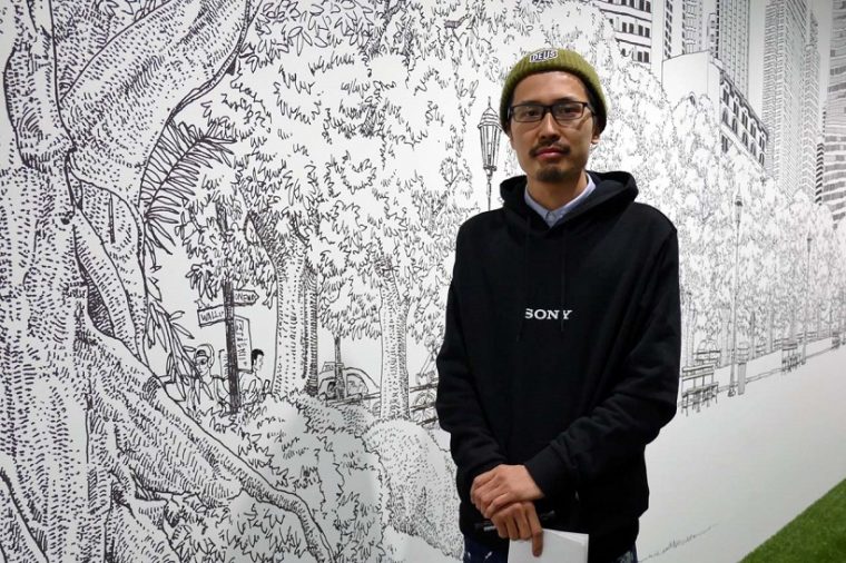↑120mの壁面をマジックで描いたウォールアートはイラストレーター黒地秀行さんの手によるもの