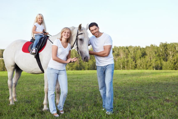 11699027 - family with a child on a horse