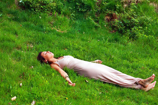 10521264 - young woman finds peace and pleasure in nature