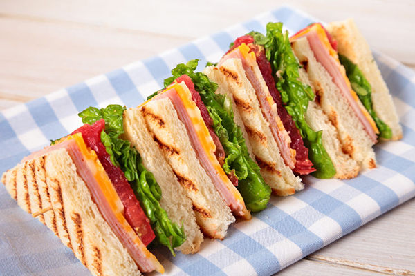 59005446 - summer picnic club sandwich ham and cheese in a row