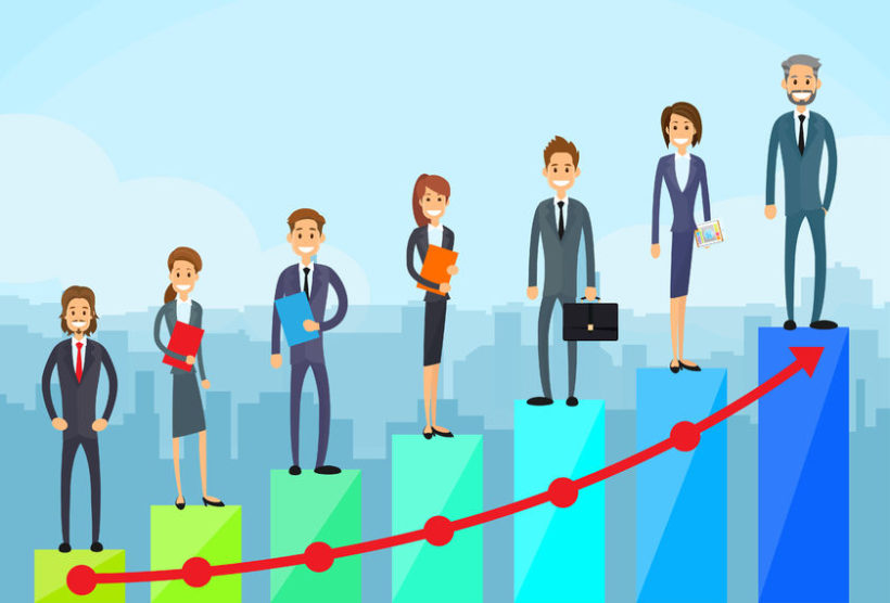 42468728 - business people standing on financial bar graph